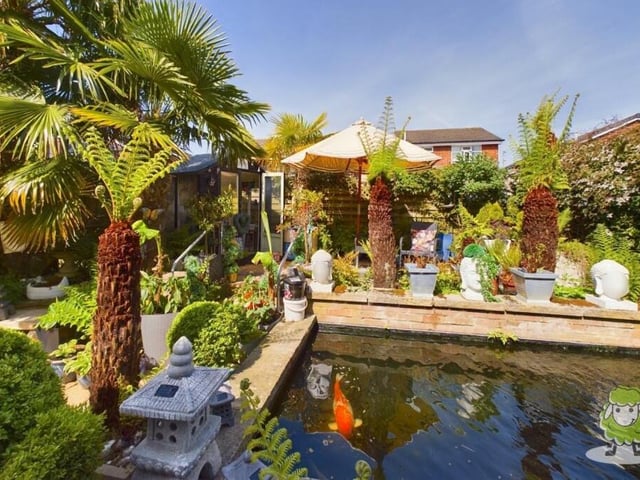 At the heart of the tropical garden is this serene fish pond for koi carp.