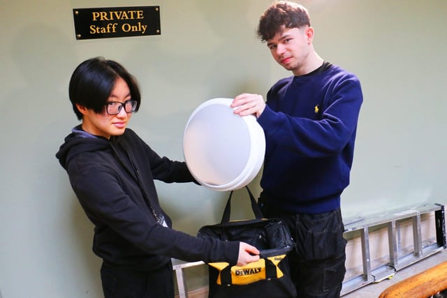 Joinery students Choi Wong and Michael Commins-Nash worked with the maintenance staff.