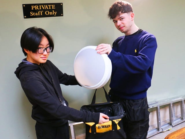 Joinery students Choi Wong and Michael Commins-Nash worked with the maintenance staff.