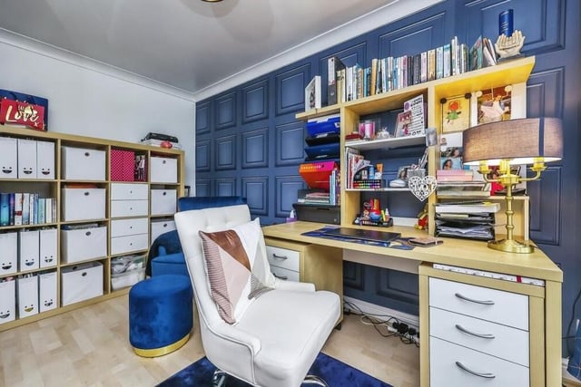 This colourful study or office is ideal for those who prefer to work from home. It boasts a laminated floor and a uPVC double-glazed bay window facing the front of the Portland Road house.