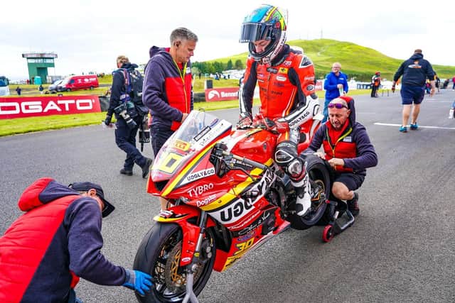 The team work on Max Cook's bike at Knockhill.