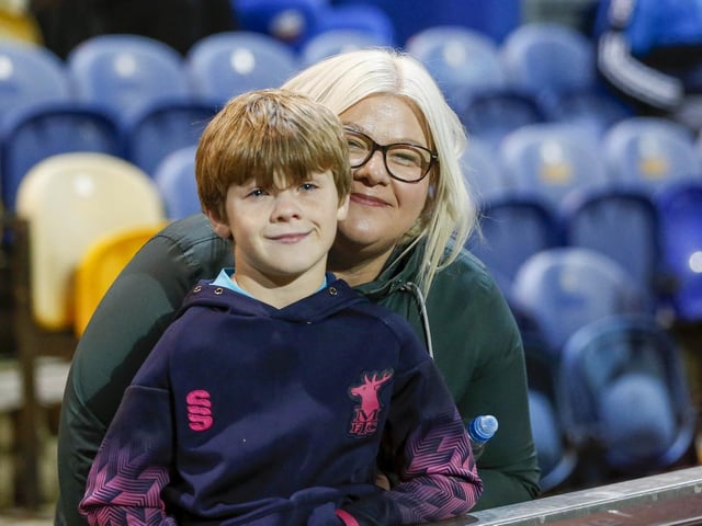 Mansfield Town fans watching the draw with Wrexham.