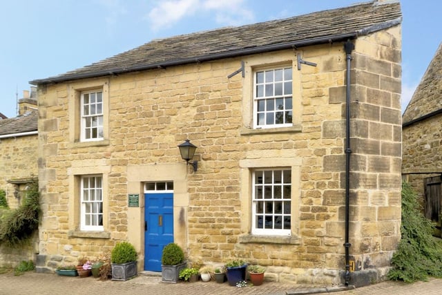 This four-bedroom home - a Grade II listed former inn in The Square, Eyam - has an asking price of £725,000. (https://www.zoopla.co.uk/for-sale/details/55295026)