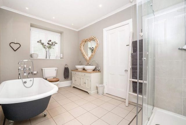 The house has three modern bathrooms