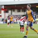 Mansfield Town defender Oli Hawkins celebrates his late winning goal at Crewe Alexandra on Saturday - photo by Chris Holloway/The Bigger Picture.media