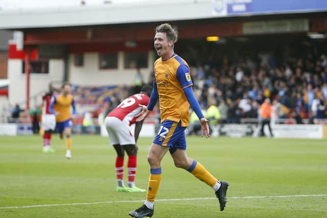 Mansfield Town defender Oli Hawkins celebrates his late winning goal at Crewe Alexandra on Saturday - photo by Chris Holloway/The Bigger Picture.media