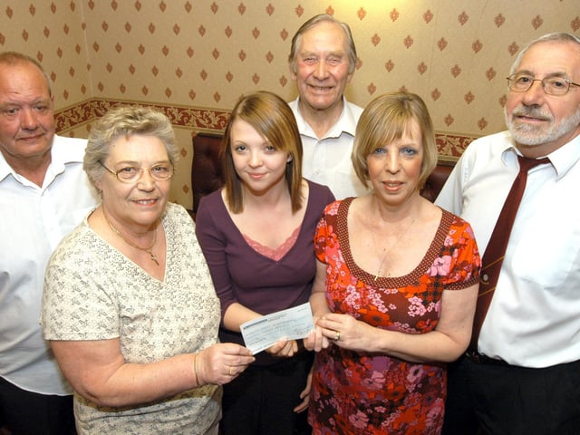 Barbara Sumner, second left and Lynne Hutchinson, second right, trustee of Clipstone Social Club, present a cheque for £500 to Emma Dallman at the club. Also pictured from the left are Fred Newbold, Reg Berrisford and Reg Kerry, steward. 2007.