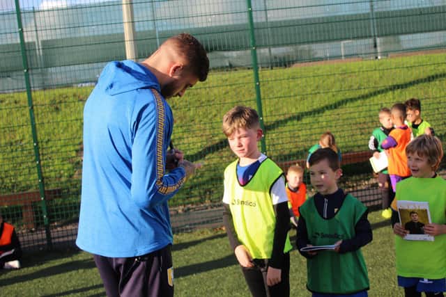 Defender Ryan Sweeney has been honoured for his help with Mansfield's FITC programme.