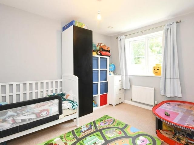 Underlining how versatile the four bedrooms are, this one lends itself perfectly for use by a young child