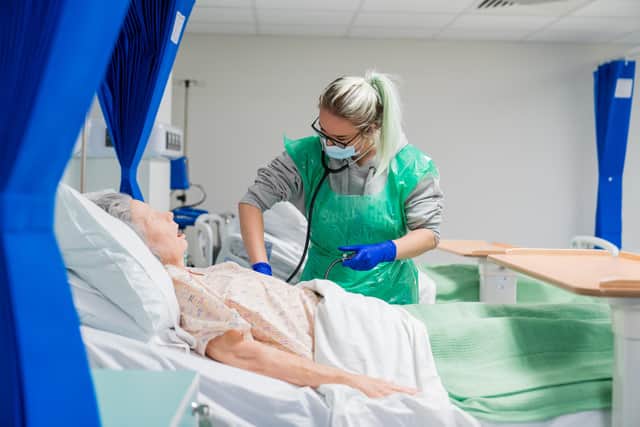A student on the nursing programme at NTU Mansfield - practising on one of the life-like dummies