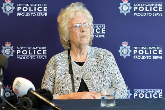 Alfred's daughter, Julie Swinscoe, at a police press conference, appealing for information.