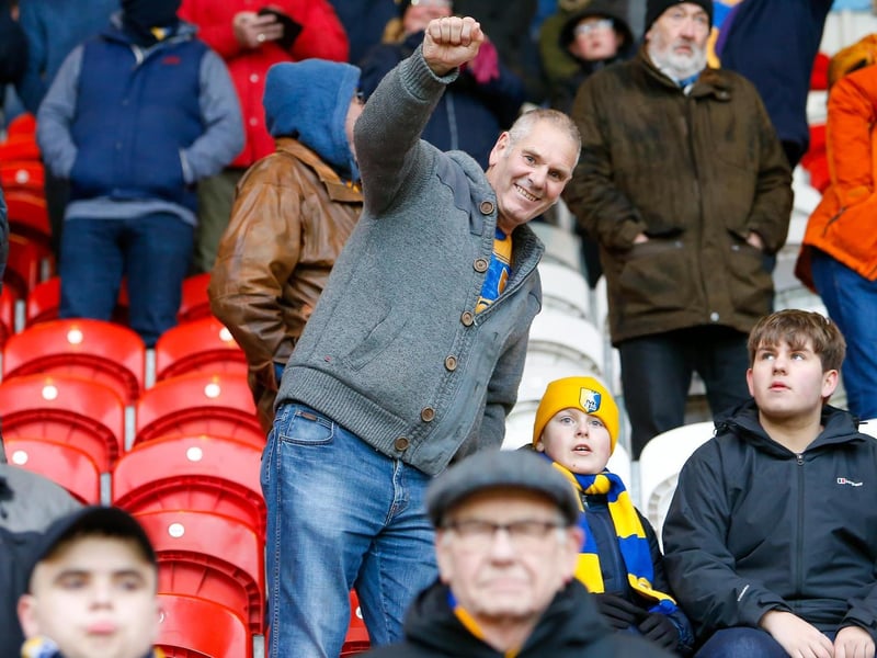 An army of over 3,300 Mansfield Town supporters watched the win at Doncaster. Can you spot a friend here?