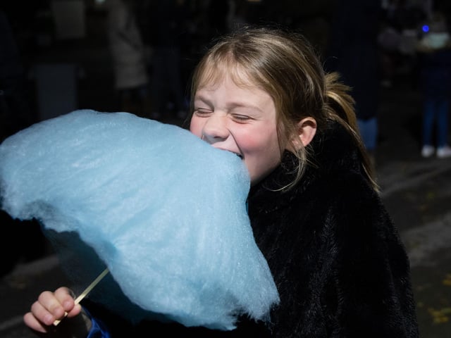 Ava, year 3, tucks into some candy floss