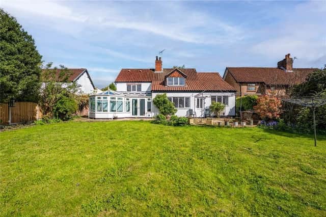 The rear garden is mainly laid to lawn with a selection of shrubs and bushes situated within. There is also a large patio area perfect for outdoor entertaining and a sun trap in a south facing garden. The garden is secured by an iron gate and fenced boundaries.