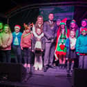 Christmas light switch on at Sutton Market Place. Chairman Coun Dale Grounds with helpers for the switch on.