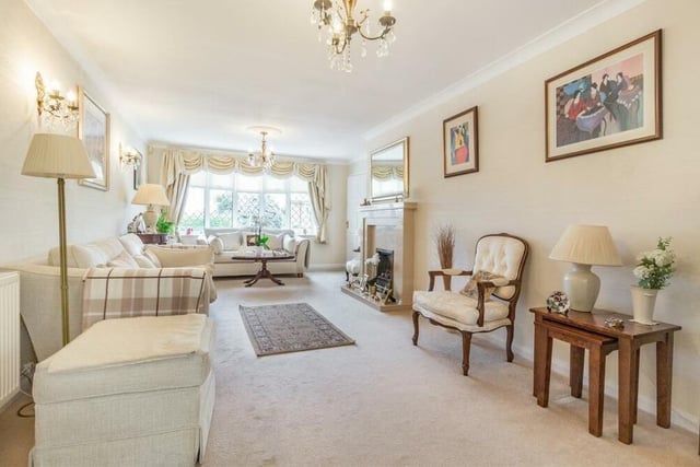 Moving into the bowels of the bungalow, let's take an admiring look at the delightful open-plan lounge, which is tastefully decorated throughout. A large window overlooks the front of the property.