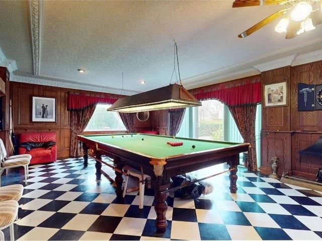 A staggering 40ft games room which could be utilised as any buyer saw fit due to the sheer size of the space on offer but currently in use as grand games room with snooker table, bar area, large double glazed windows offering those delightful views over the rear garden and open views beyond over the local park.