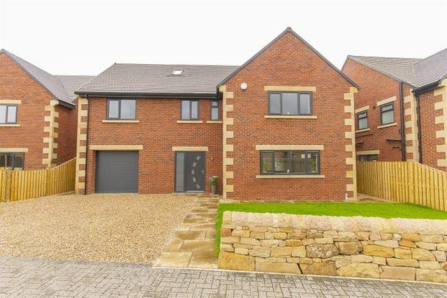 This five bedroom house in secure gated development has an open plan living space, four bathrooms and a utility room. Marketed by Wilkins Vardy, 01246 580064.