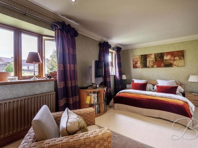 The master bedroom sits on the ground floor and comes complete with a cream carpet and bespoke oak skirting boards, architraves and window frames. Its brightness comes from two double-glazed, double windows, one of them a beautiful bay.