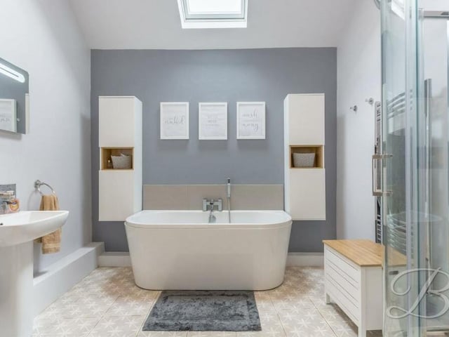 The family bathroom in the centre of the Chesterfield Road property is a dream space, hosting a superb, free-standing bath and displaying a stylish decor.