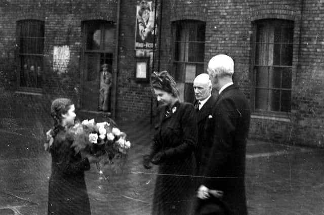 A lovely moment as the Princess receives a bouquet of flowers on her visit to the Eye Infirmary.