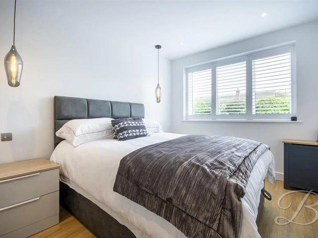 The bedrooms benefit from built-in wardrobes offering excellent storage solutions