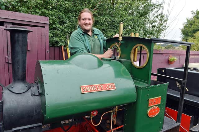 Sherwood Forest Railway volunteers have kept the wheels turning despite the impact of coronavirus. Bob Colley manager polishing one of the engines.