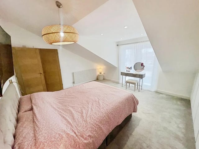One of four spacious bedrooms in the property