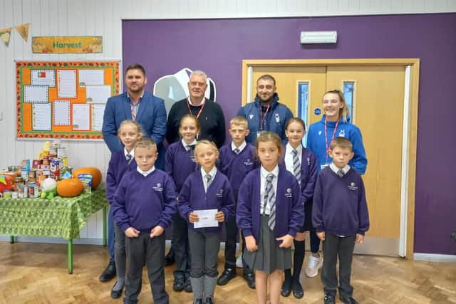 Craig Gould and Lee Anderson visited Skegby Junior Academy alongside Nottingham Forest Midfielder, Naomi Powell, and Nottingham Forest Coach, Andy Cook, to present them with a Nottingham Forest Women Football Club season ticket