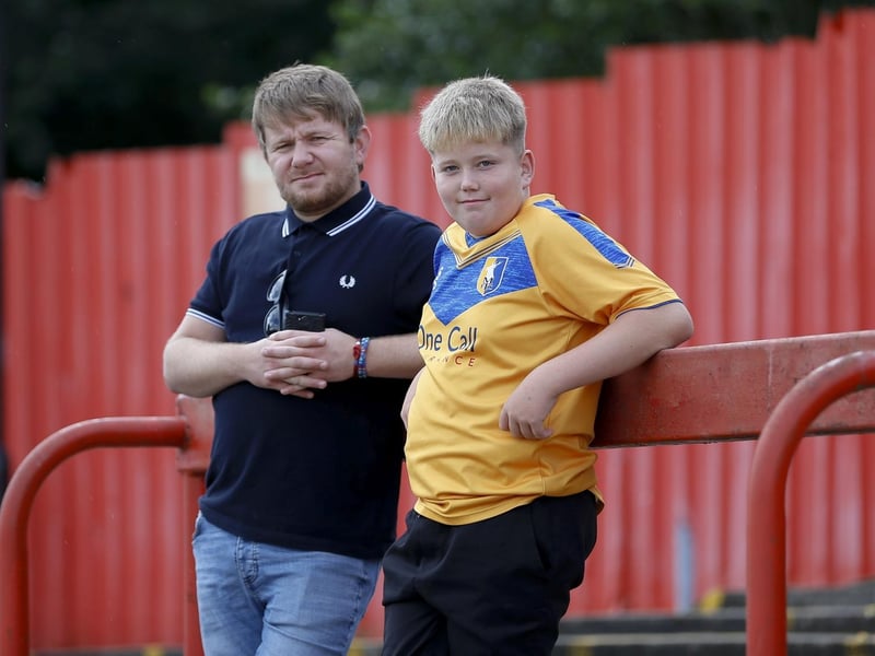 Mansfield Town fans watch a convincing 4-0 win at Alfreton Town.