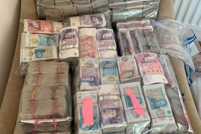 Millions in cash were recovered in the swoop.