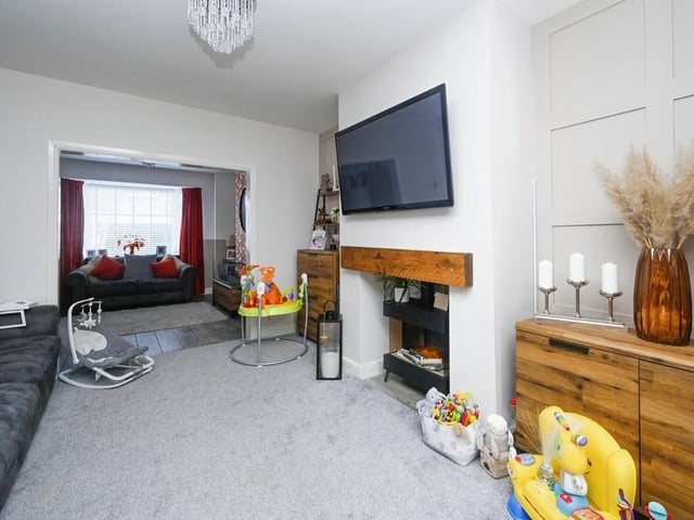 Here is the second reception room on the ground floor of the £290,000 property. Sliding patio doors lead to the dining room.
