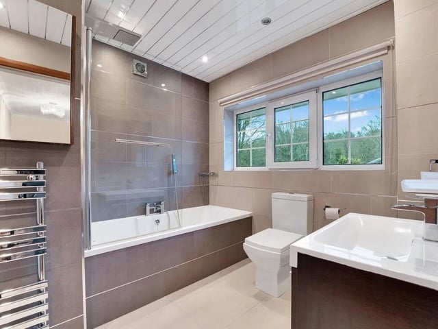 One of the stunning bathrooms in the property finished to a high standard throughout.
