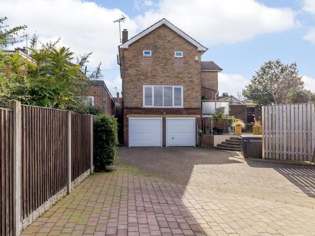 The West Bank Lea property boasts two garages, one of which has a remote-controlled, electric door. Both are equipped with power, light and heating.