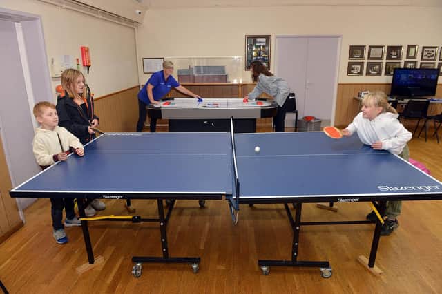 Youngsters have fun playing ping pong at the Blackwell Youth Club which is appealing for volunteer leaders.