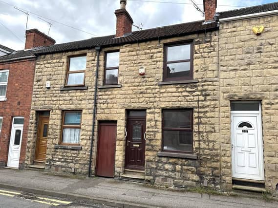 This two bedroomed mid-terrace property with additional store room is priced at £40,000 and is located at Padley Hill.