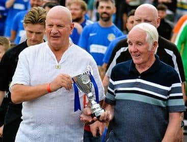 Mansfield legends, Sandy Pate (former Mansfield Town football player) and Steve Ward (England's oldest professional boxer), carried the trophy out.