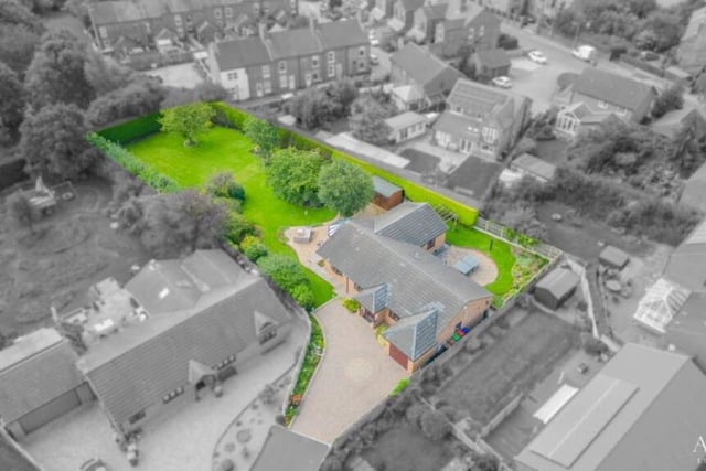Before we step inside, let's take a view from the skies with a drone shot that shows how the bungalow and its lengthy garden fit in to the Selston landscape.