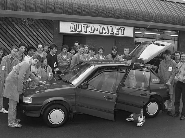 A new car is inspected back in 1989.