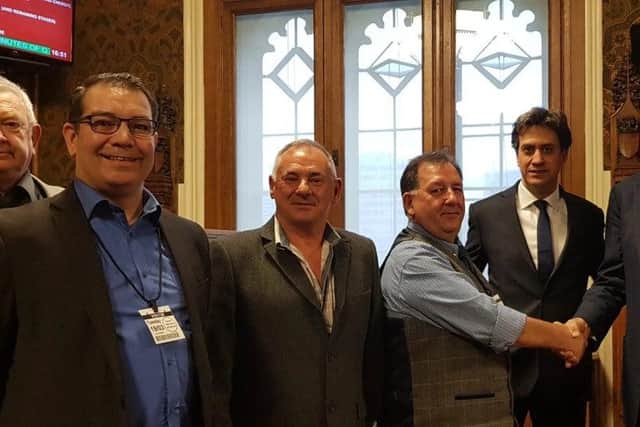 Former mineworkers and campaigners in Parliament in 2019, with ex-Labour leader Ed Miliband.