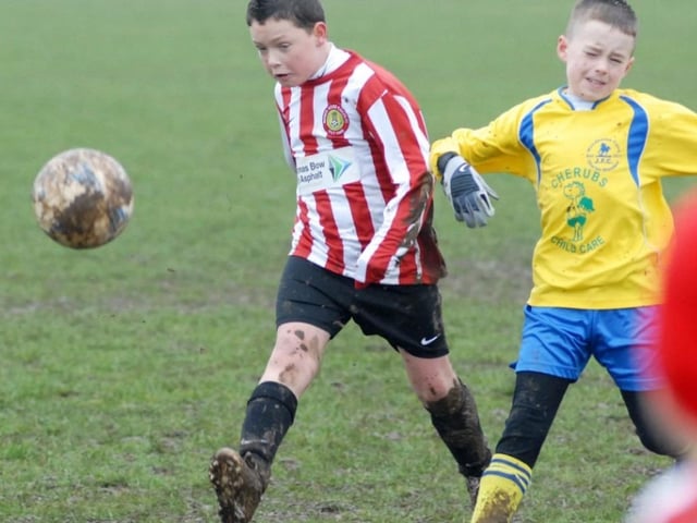 Robin Hood Colts (red and white stripes) v Woodhouse Colts U9s pictured at the Sherwood Fields ground in Edwinstowe in 2011