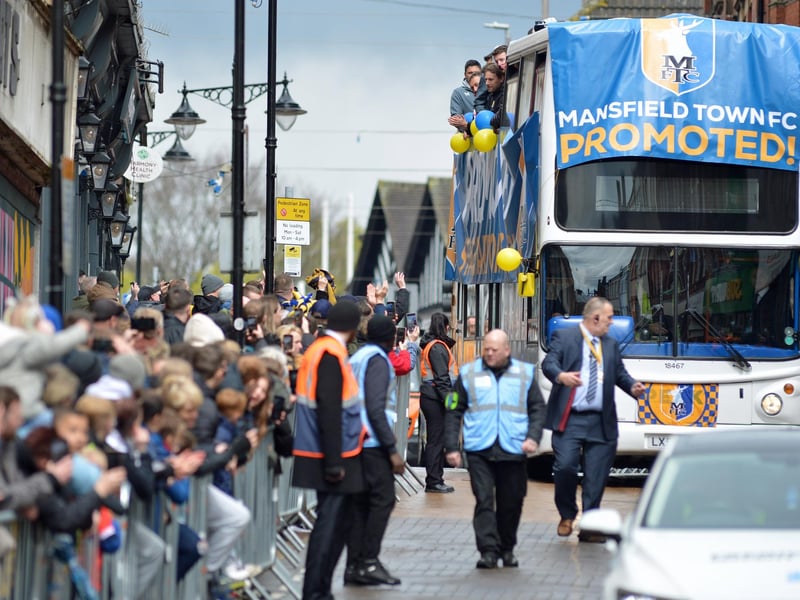 Fans line the street.