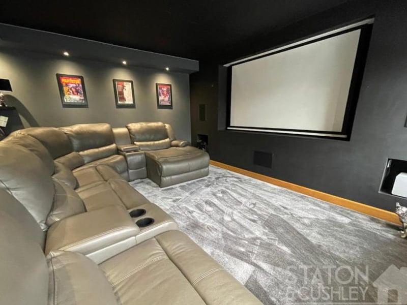 The lounge, separate to the open-plan area, is currently being used as this spectacular cinema room. Sit back, relax and enjoy!
