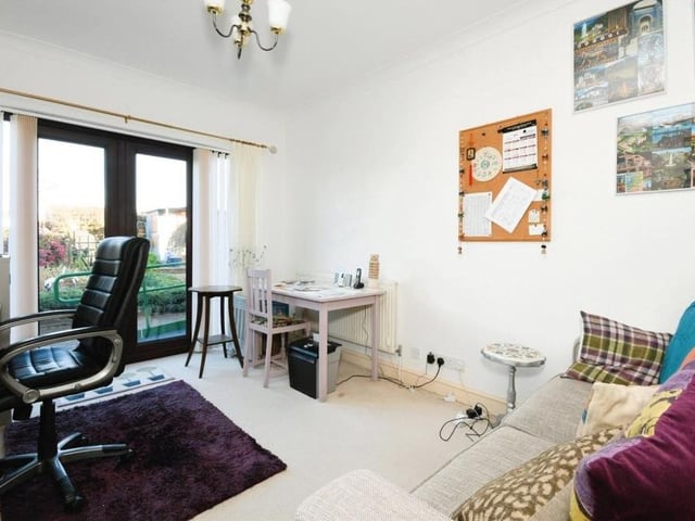 Here is the third spacious double bedroom, which is currently being used as an office. Double patio doors led out to the back garden.