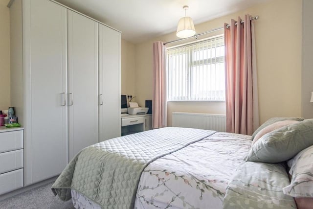 This second shot of bedroom number two shows there is space for a range of fitted furniture, including large wardrobes and also drawer units.