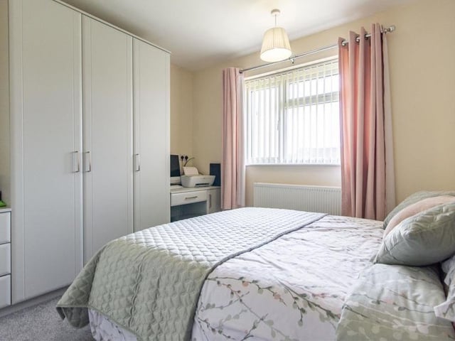 This second shot of bedroom number two shows there is space for a range of fitted furniture, including large wardrobes and also drawer units.