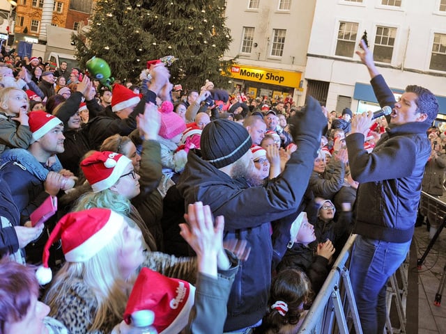Mansfield Christmas lights switch on 2018.             Brotherhood's lead singer gets close to the audience.