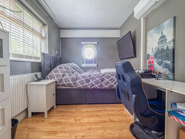 Hidden away on the ground floor is this cosy bedroom, which is attractively presented.