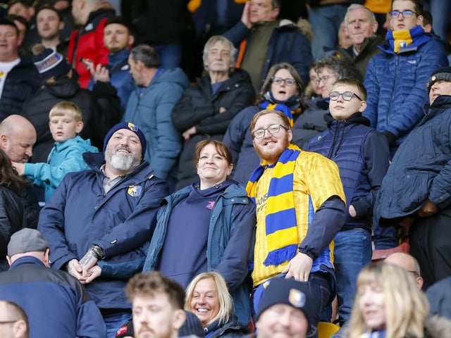 Travelling Stags fans watch the Sky Bet League 2 match against Bradford City.