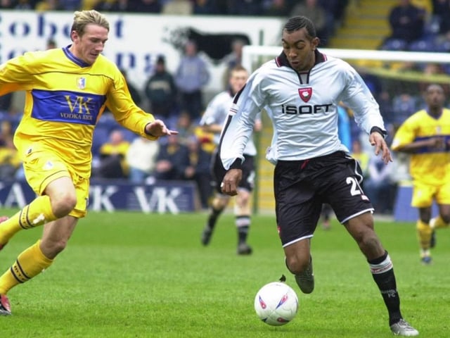 Liam Lawrence closes in on Kevin Betsy.